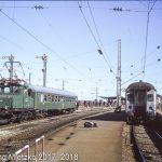 169 002-3 in Murnau mit Kurswagen am 14.07.1980
